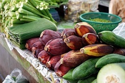 Banana flowers and leaves for sale in the Thanin market in Chiang Mai, Thailand