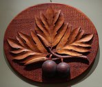 Ulu (Breadfruit), carved wooden plaque by Frank Nicholas Otremba (1851-1910), Bernice P. Bishop Museum