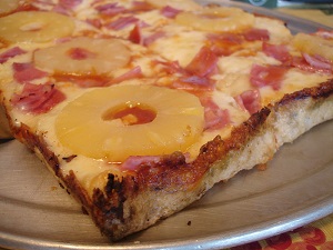Close-up view of a Hawaiian pan pizza