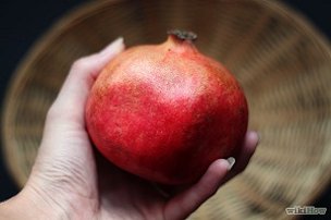 Look for pomegranates that feel heavy