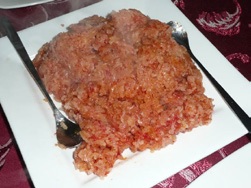 The traditional Vietnamese dish xoi gac made with sticky rice and aril